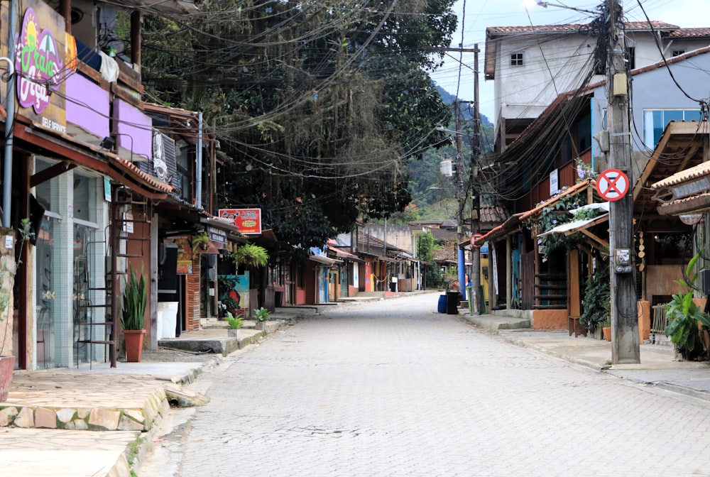 a narrow street with a few buildings on both sides