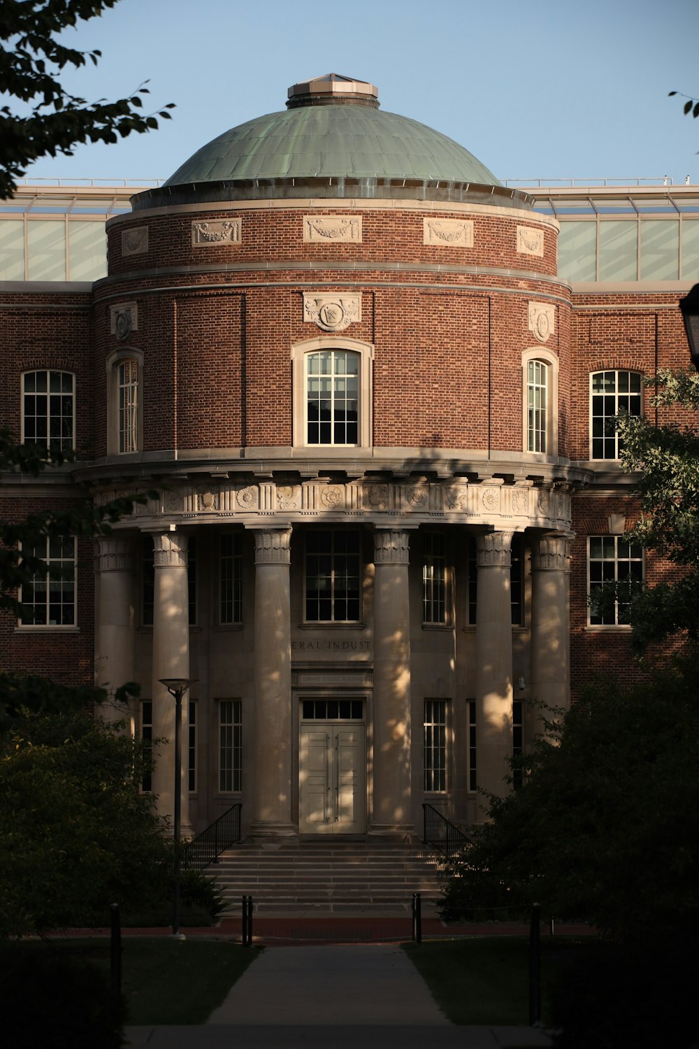 a brick building with a dome on top of it