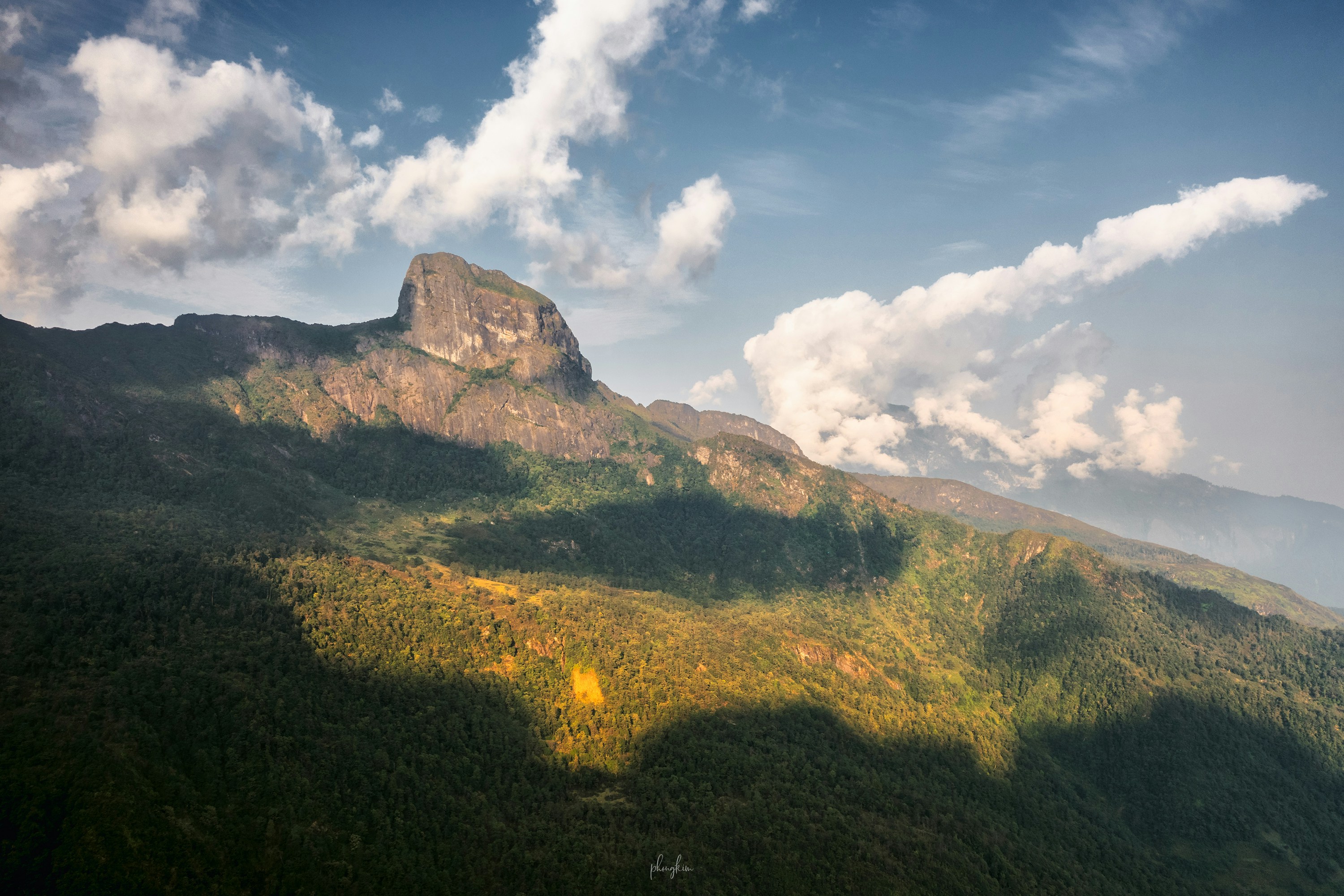 Mountain with clouds in the sky