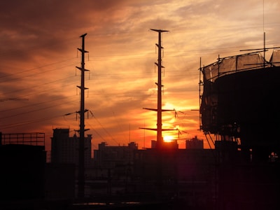 Image of a city skyline at sunset symbolizing environmental progress.