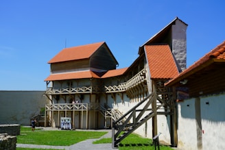 Screenshot of the game’s building mechanics with players constructing defenses in a lively environment.