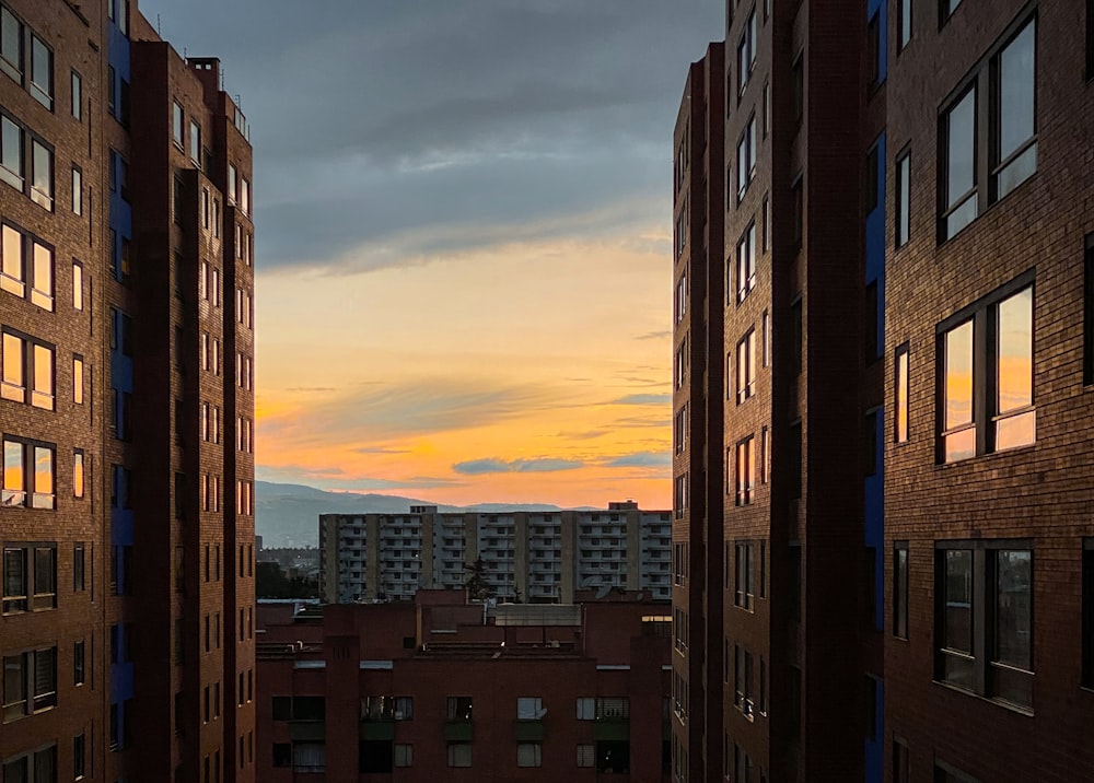 a view of a sunset from a high rise building