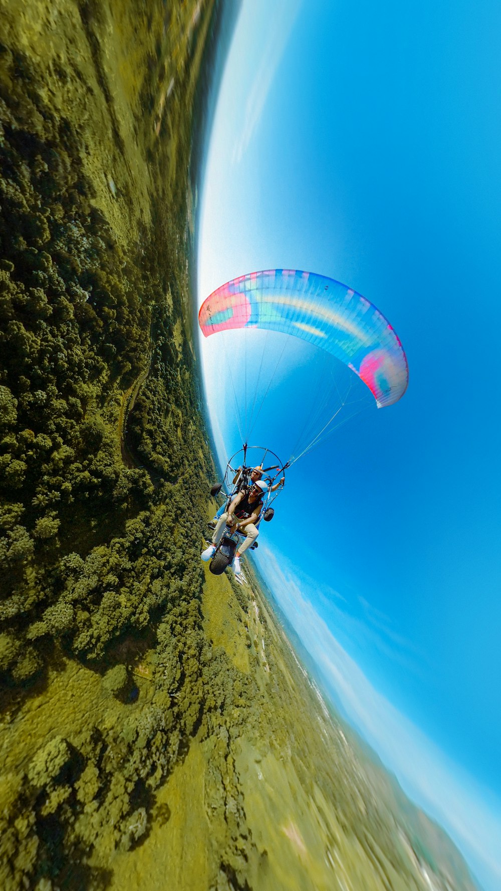 a person is parasailing in the water on a sunny day