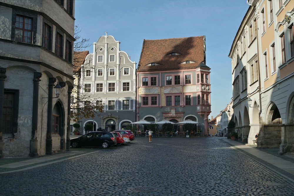 a cobblestone street in a european city