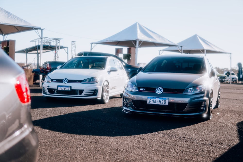 a couple of cars parked next to each other