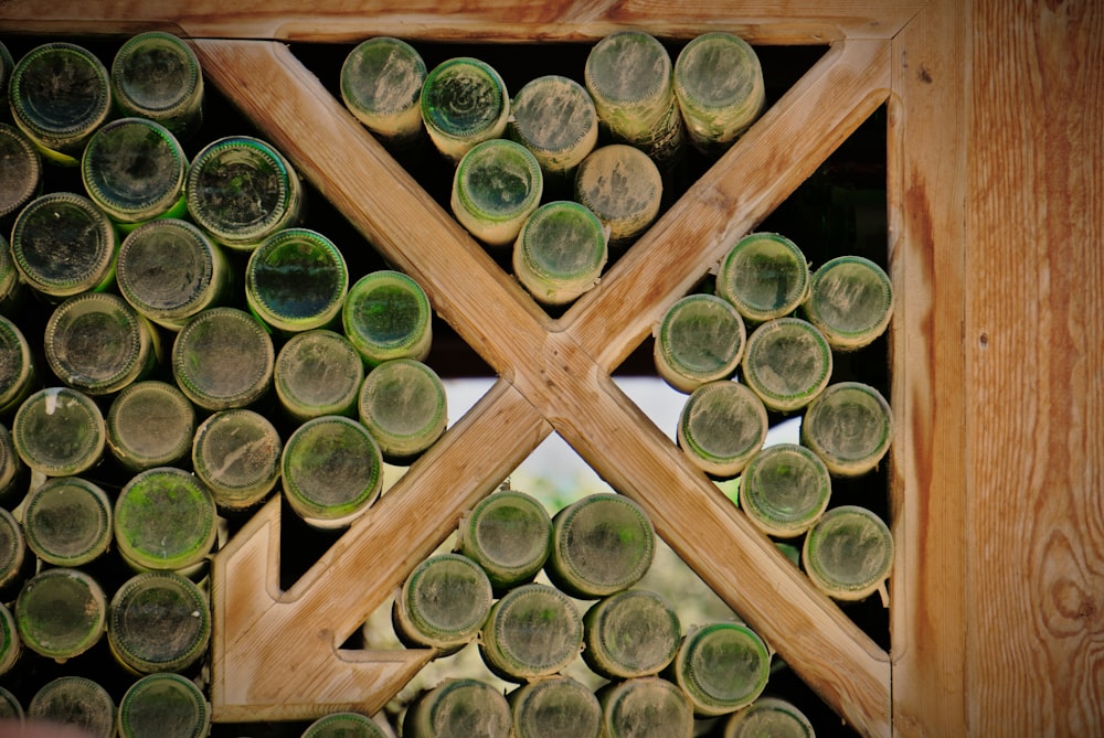 a close up of a wall made out of wine bottles