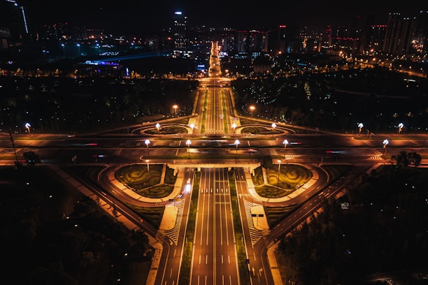 an aerial view of a city at night