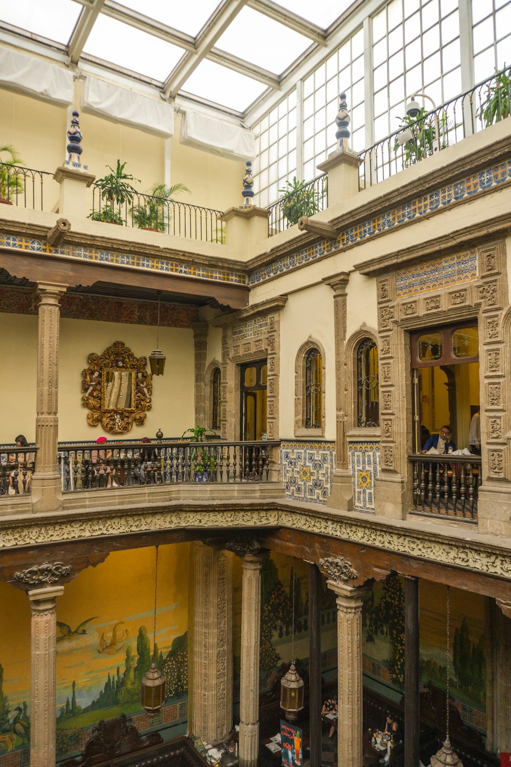 a large building with a lot of windows and a balcony