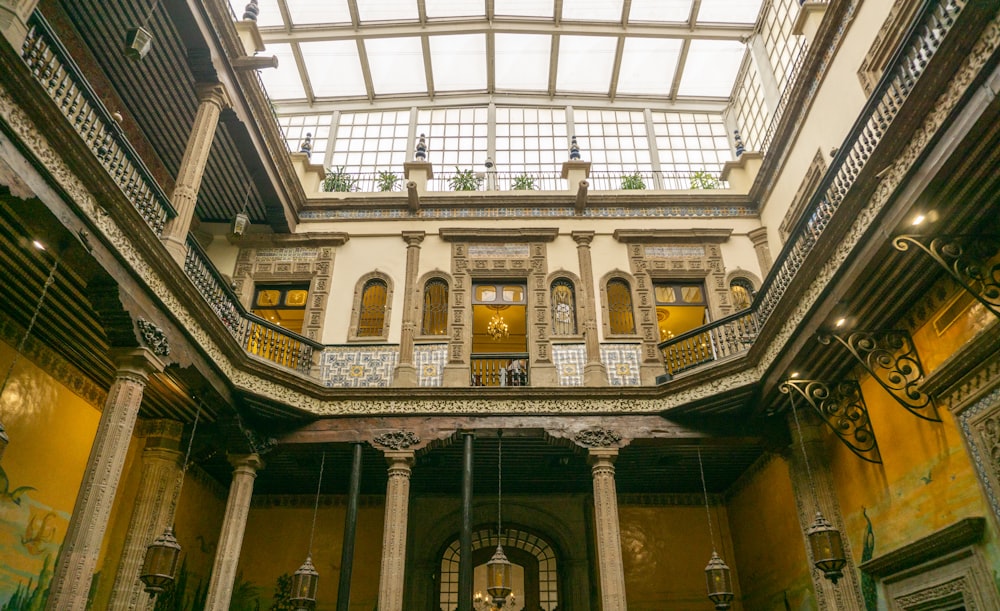 the inside of a building with a skylight above it