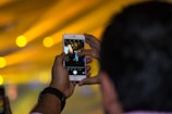Close-up of a person filming a product with a smartphone.