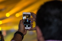 Close-up of a camera capturing dynamic social media content.