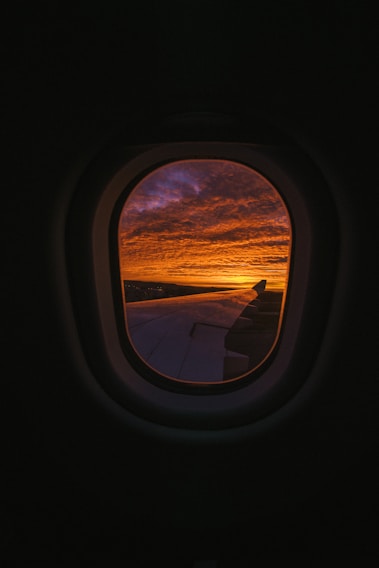 A stunning sunset view from an airplane window.