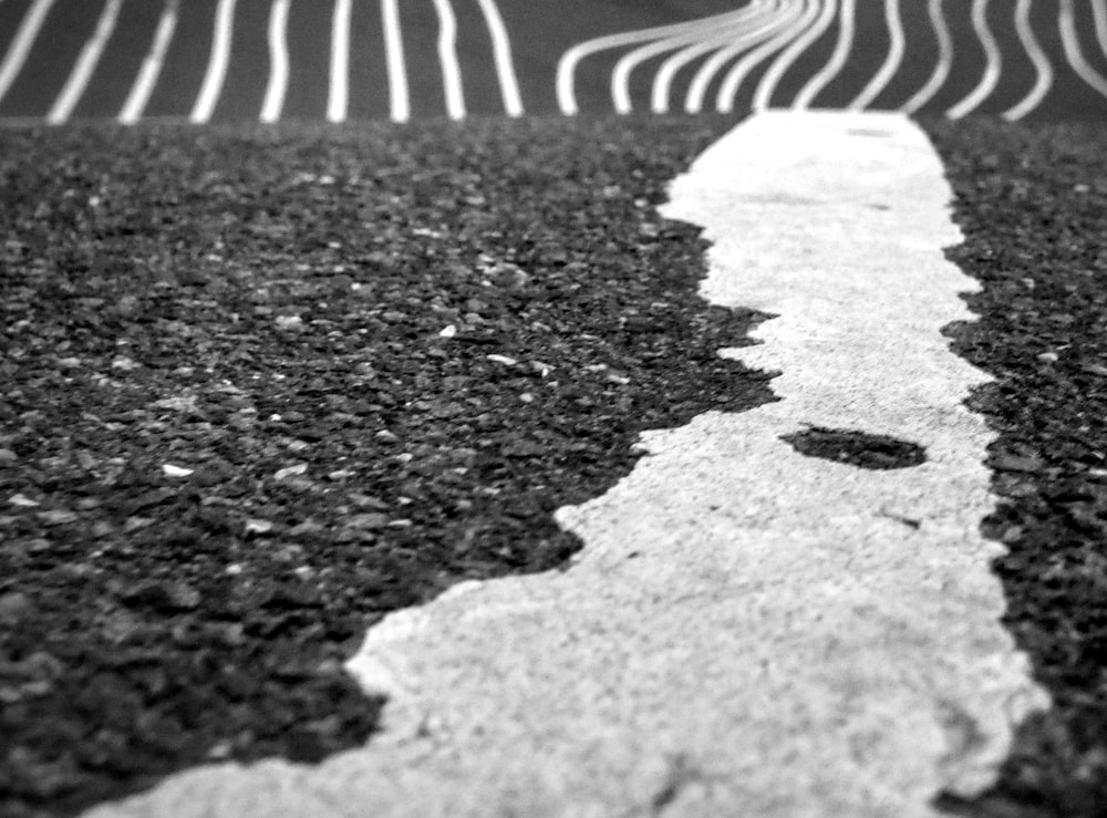 a black and white photo of a street