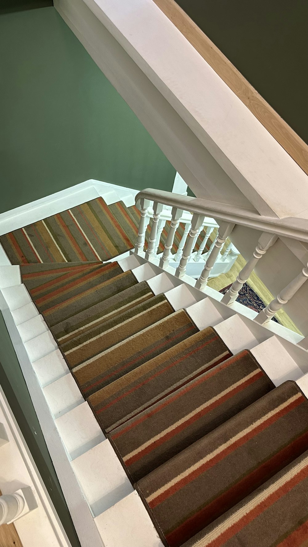 a set of stairs with carpet on them