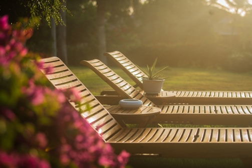 A stylish lounge chair set up in a beautiful outdoor setting.