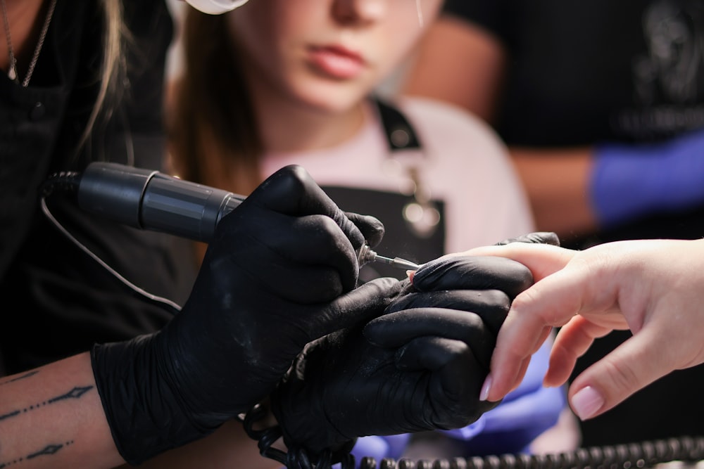 a close up of a person getting a haircut