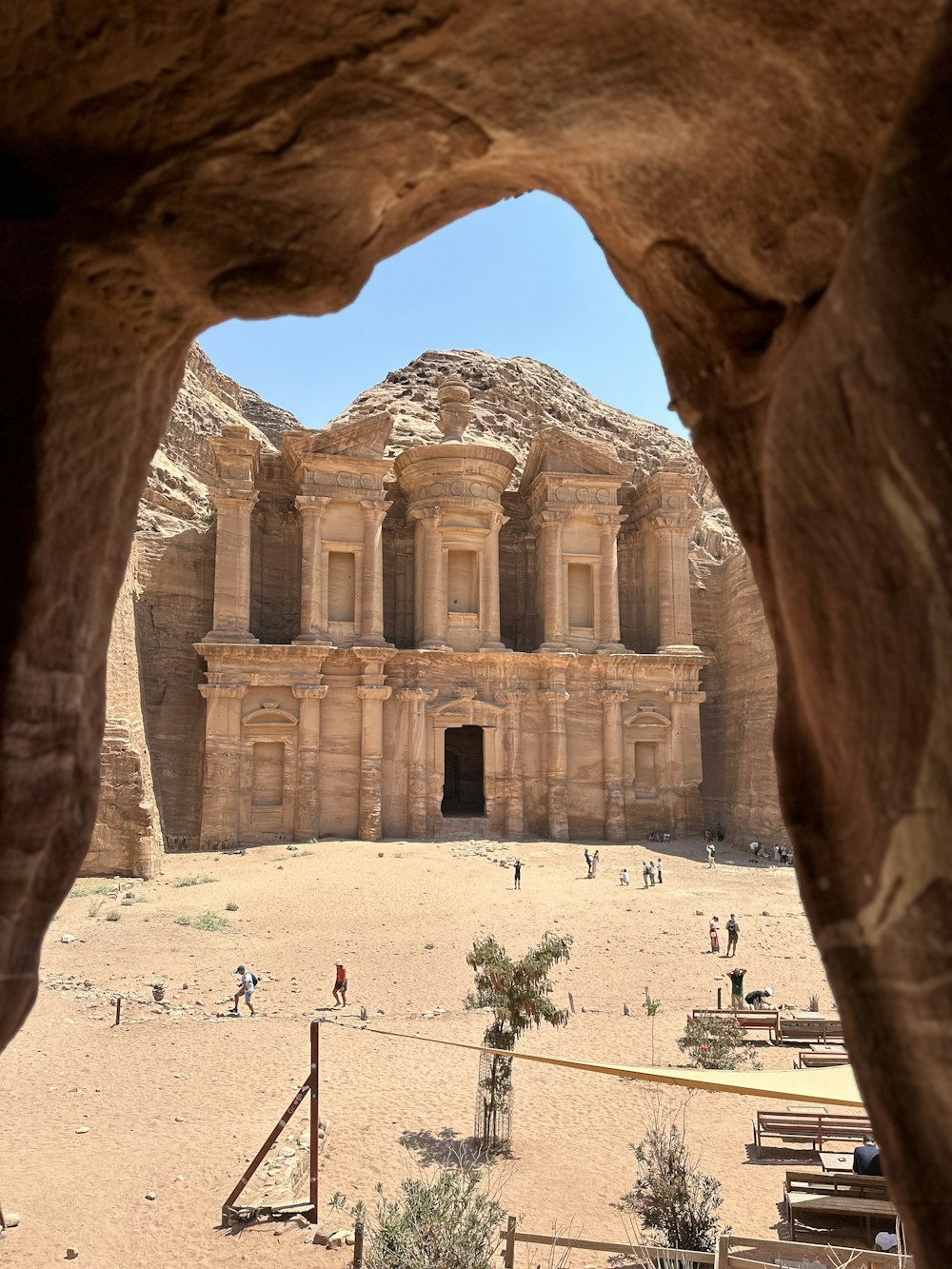 a large building in the middle of a desert