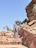 a man is standing on some steps in the desert