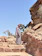 a man is standing on some steps in the desert