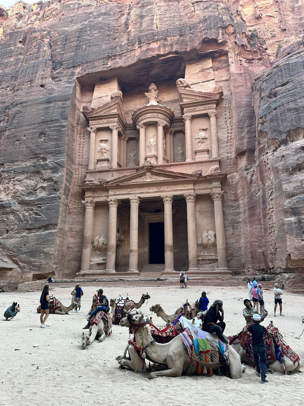 a group of people standing in front of a building