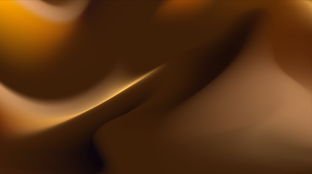a blurry image of a yellow and brown background