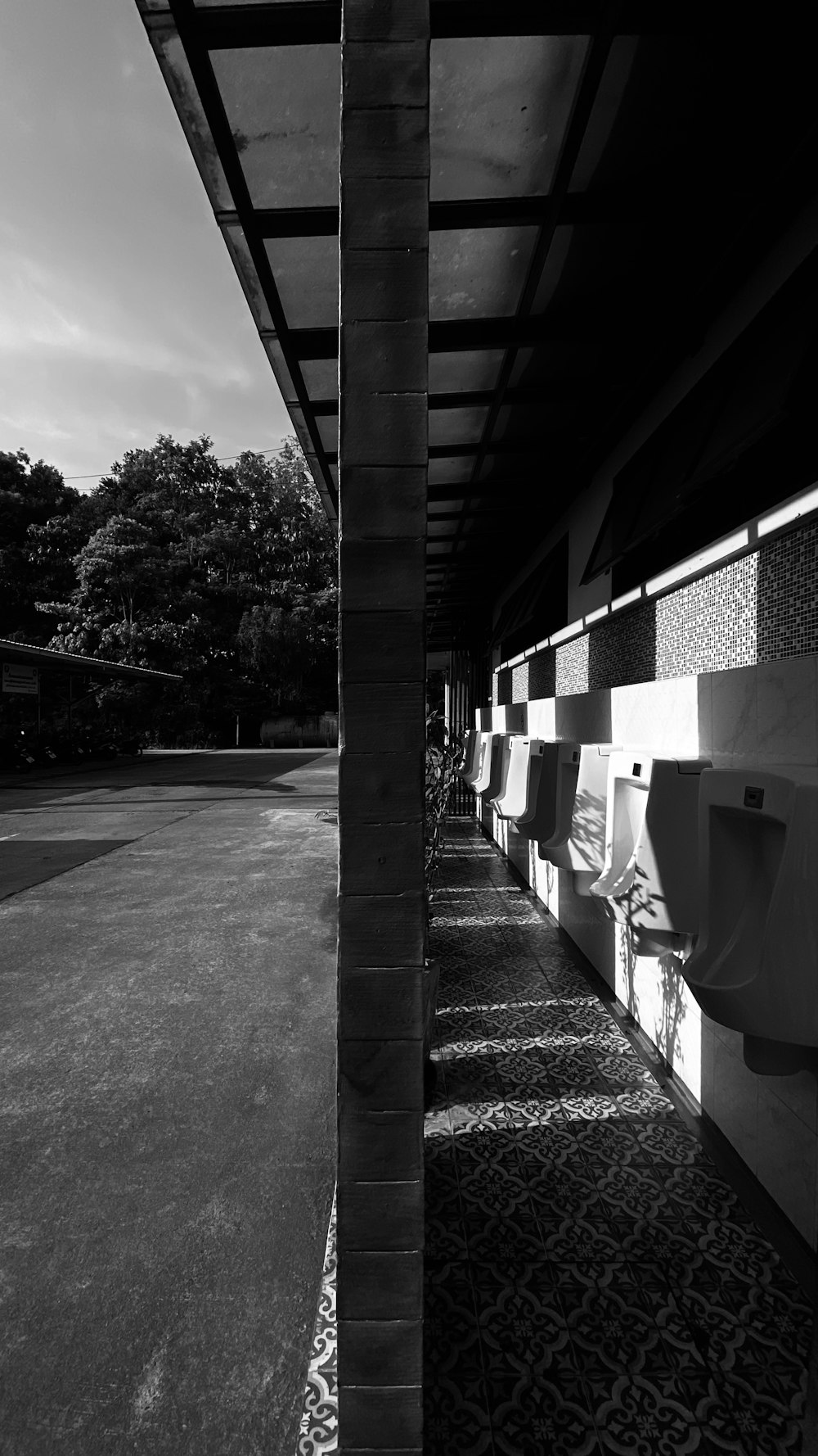 a row of urinals sitting next to each other