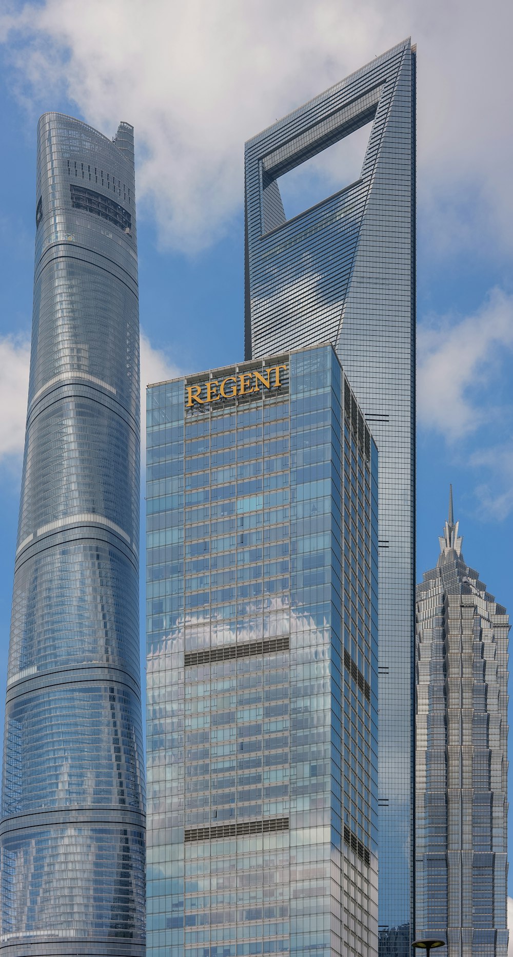 a very tall building with a sky background