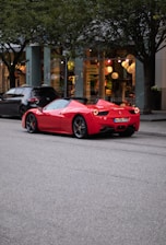 A sleek Japanese car on a city street during daylight.