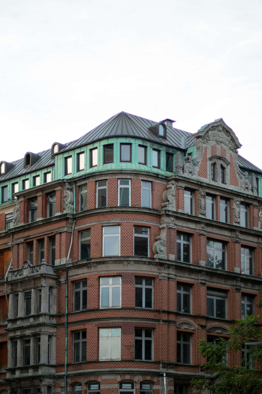 a large building with a clock on the top of it