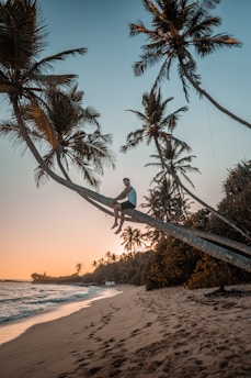 An expat enjoying a sunset on a beach in Panama.