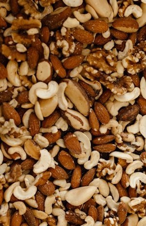 a mixture of nuts and nutshells in a bowl