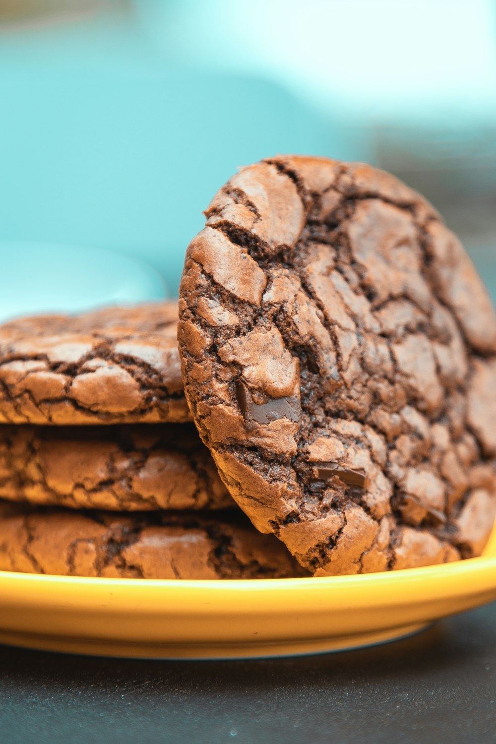 a plate of chocolate cookies on a table