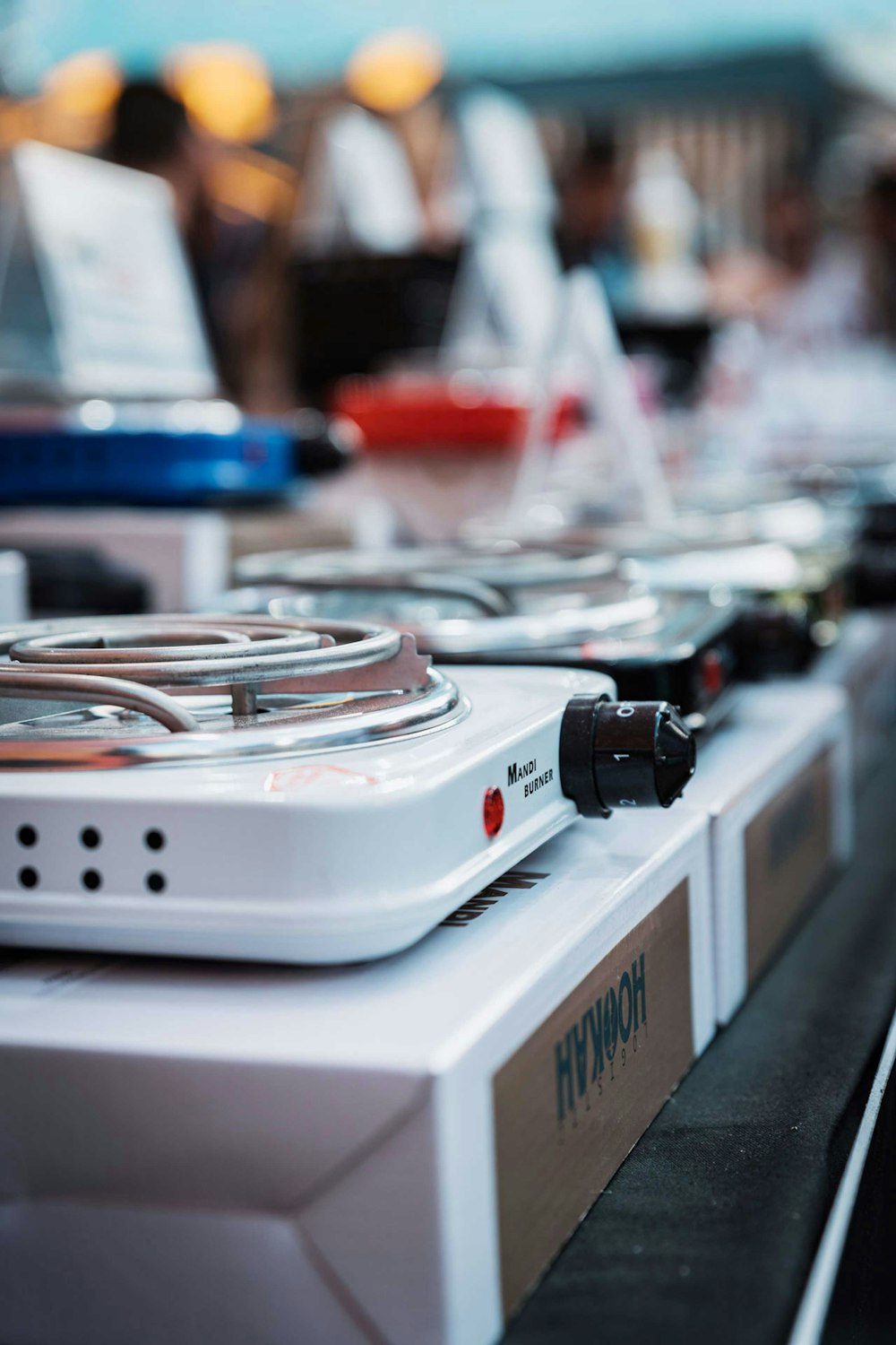 a close up of a stove top on a table