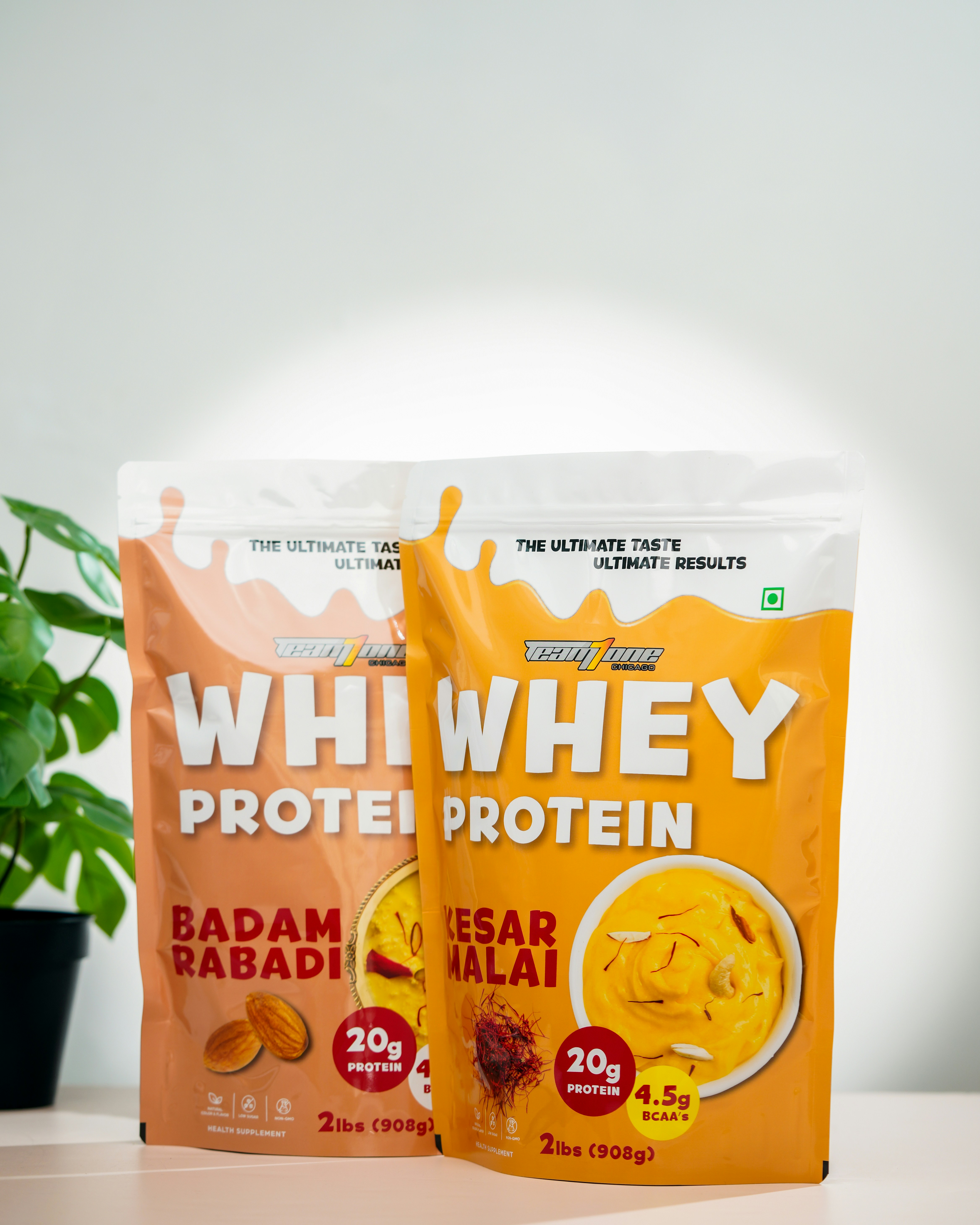 a couple of bags of protein sitting on top of a table