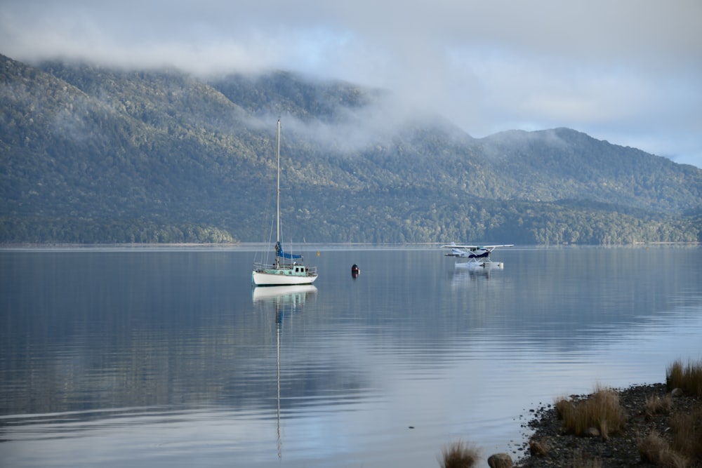 two boats floating on a large body of water