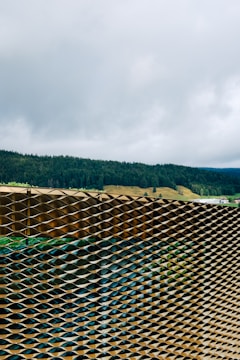 A panoramic view of various fencing installations in different environments.