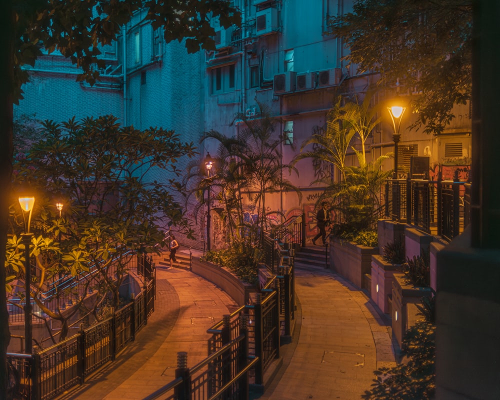 a city street at night with street lights