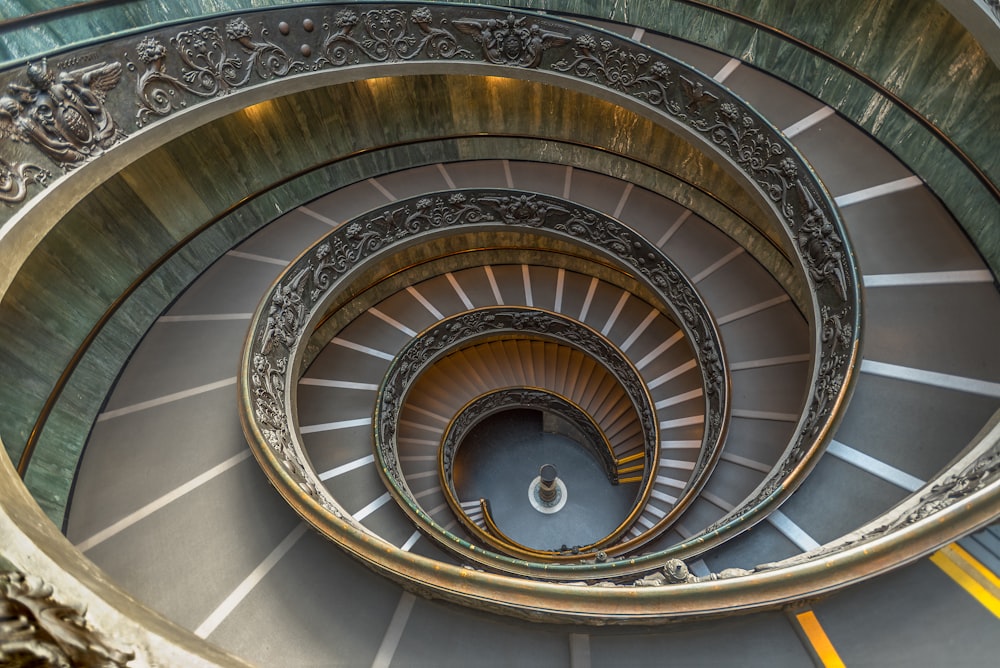 a view of a spiral staircase from the top