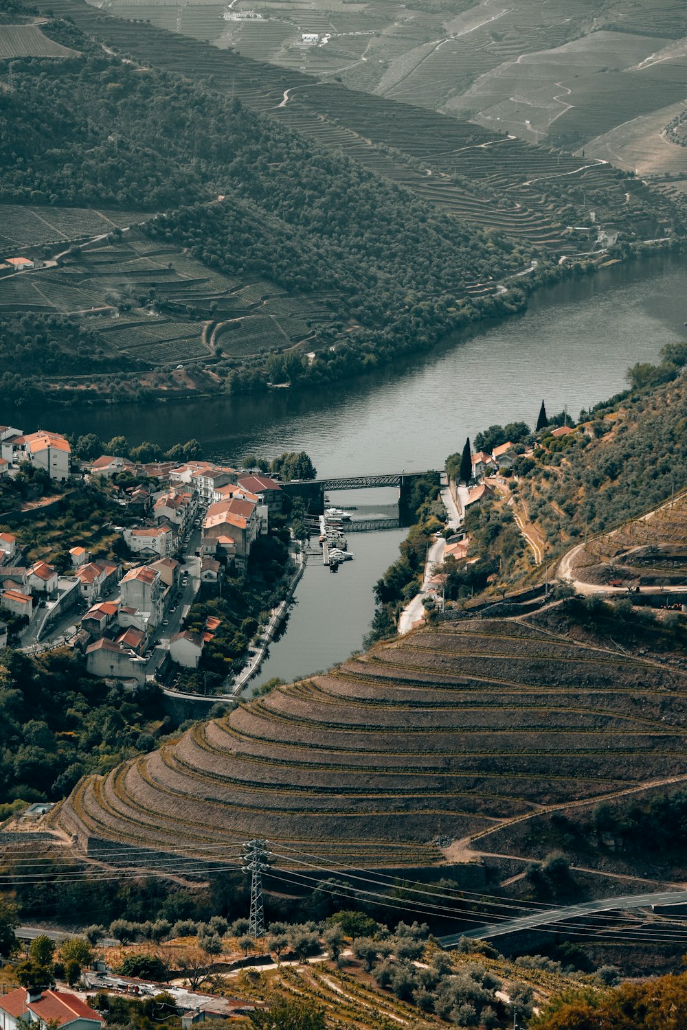 an aerial view of a town and a river