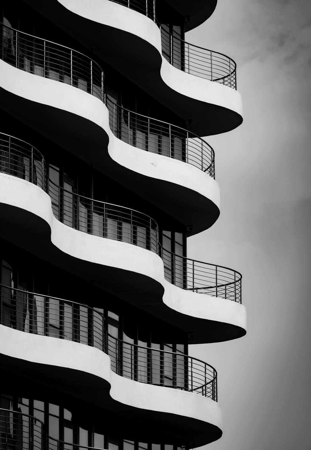 a tall building with balconies and balconies on it