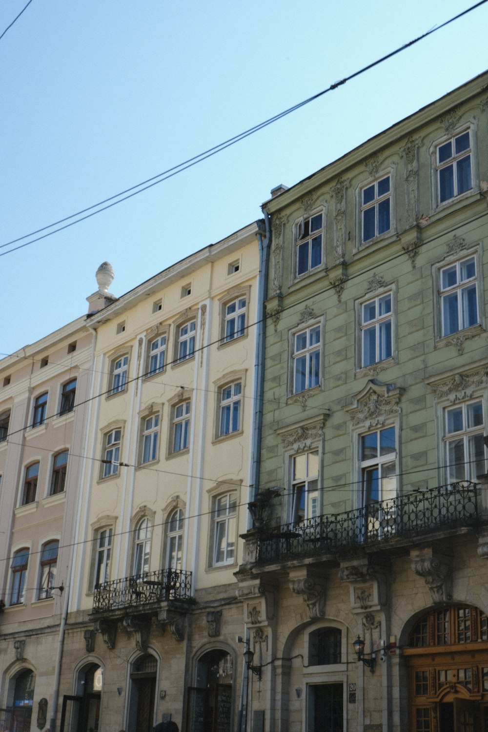 a large building with many windows and balconies