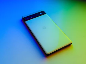 A sleek smartphone displaying a contact form with vibrant blue and gradient accents.