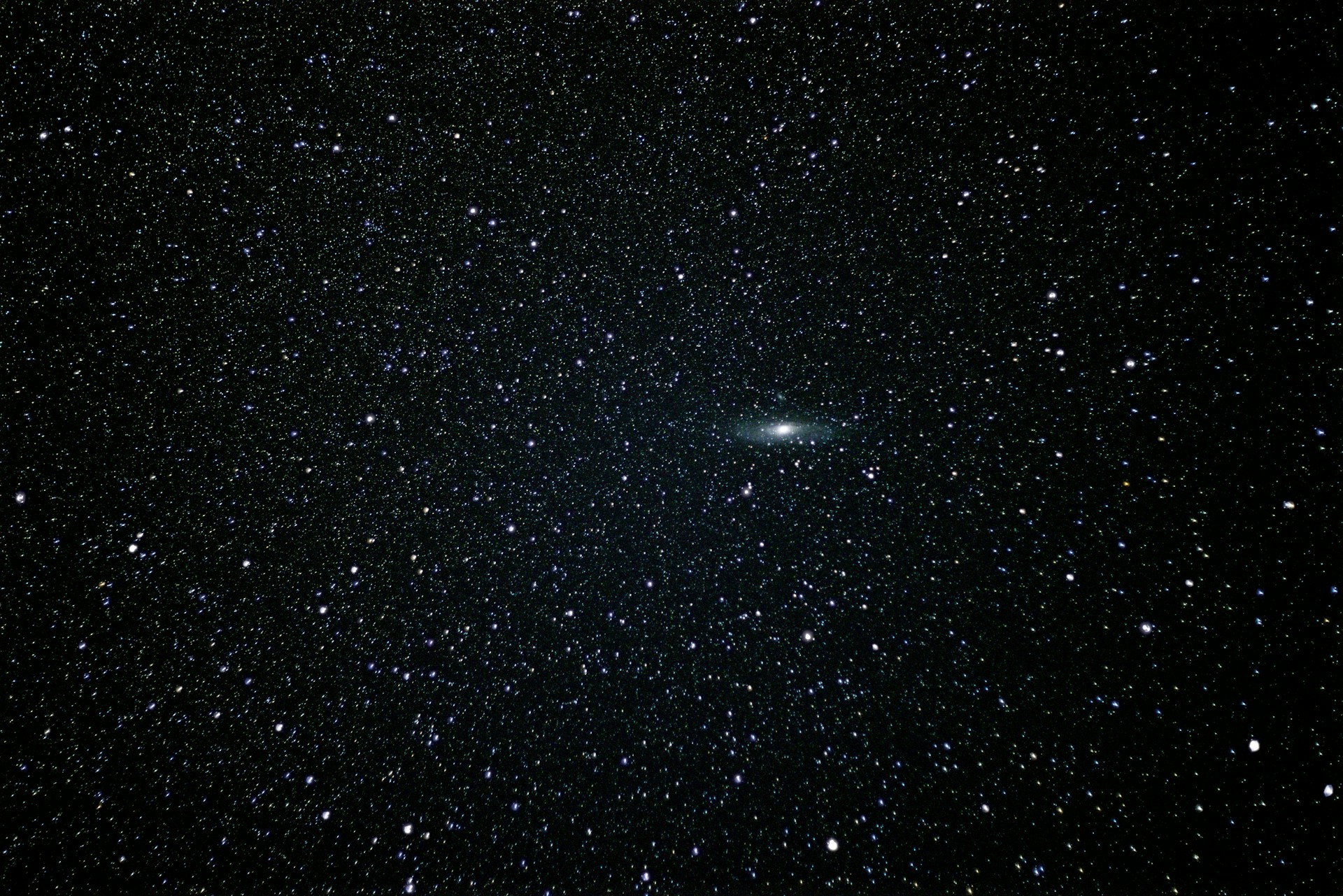 a dark sky filled with lots of stars