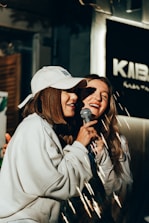 a couple of women standing next to each other