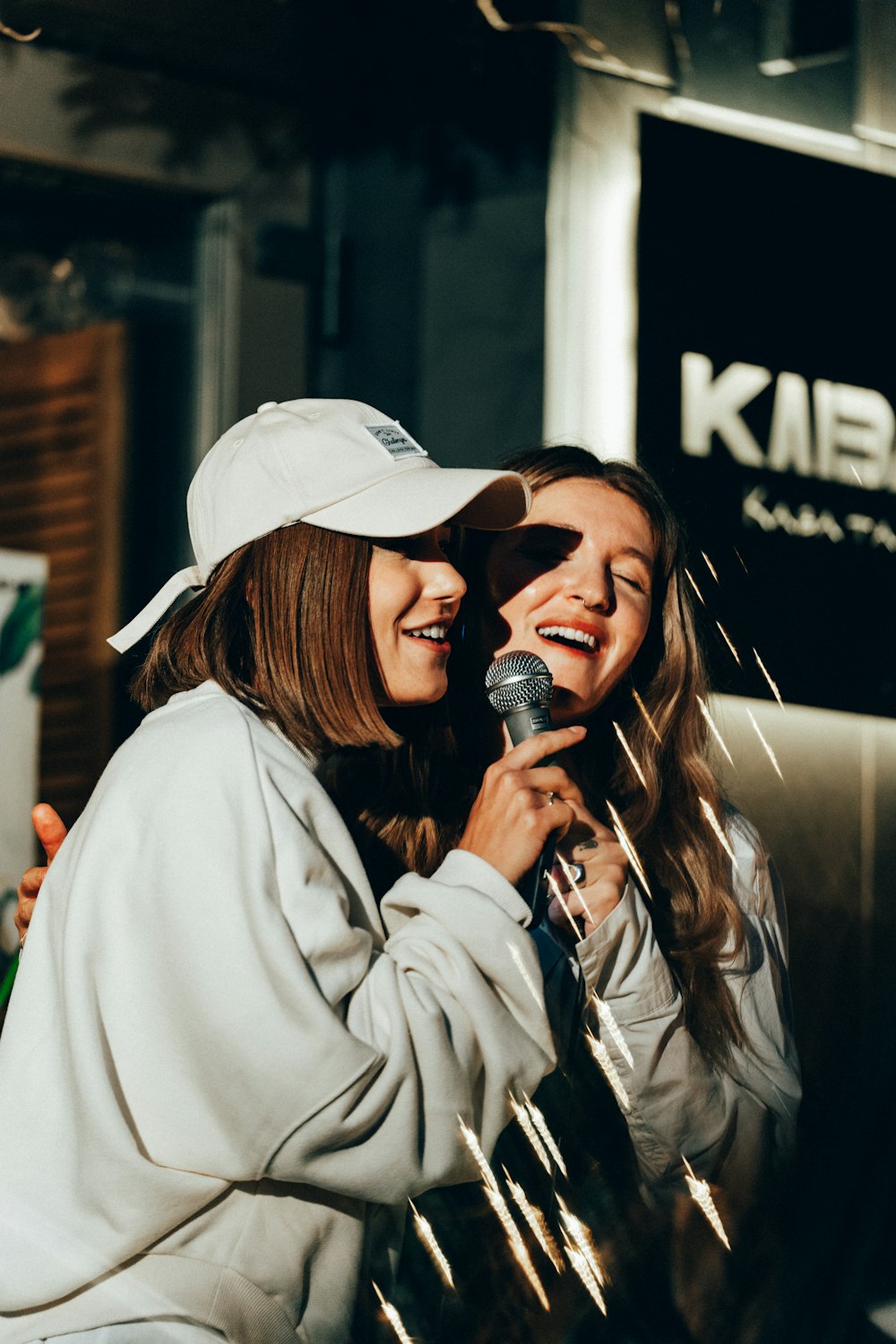 a couple of women standing next to each other