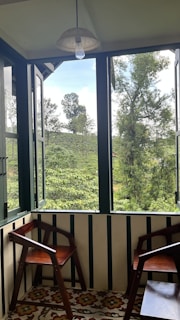 Sunlit balcony overlooking a peaceful neighborhood, part of our 75 m² mezonette design.