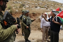 Young Druze soldiers in uniform standing proudly together.