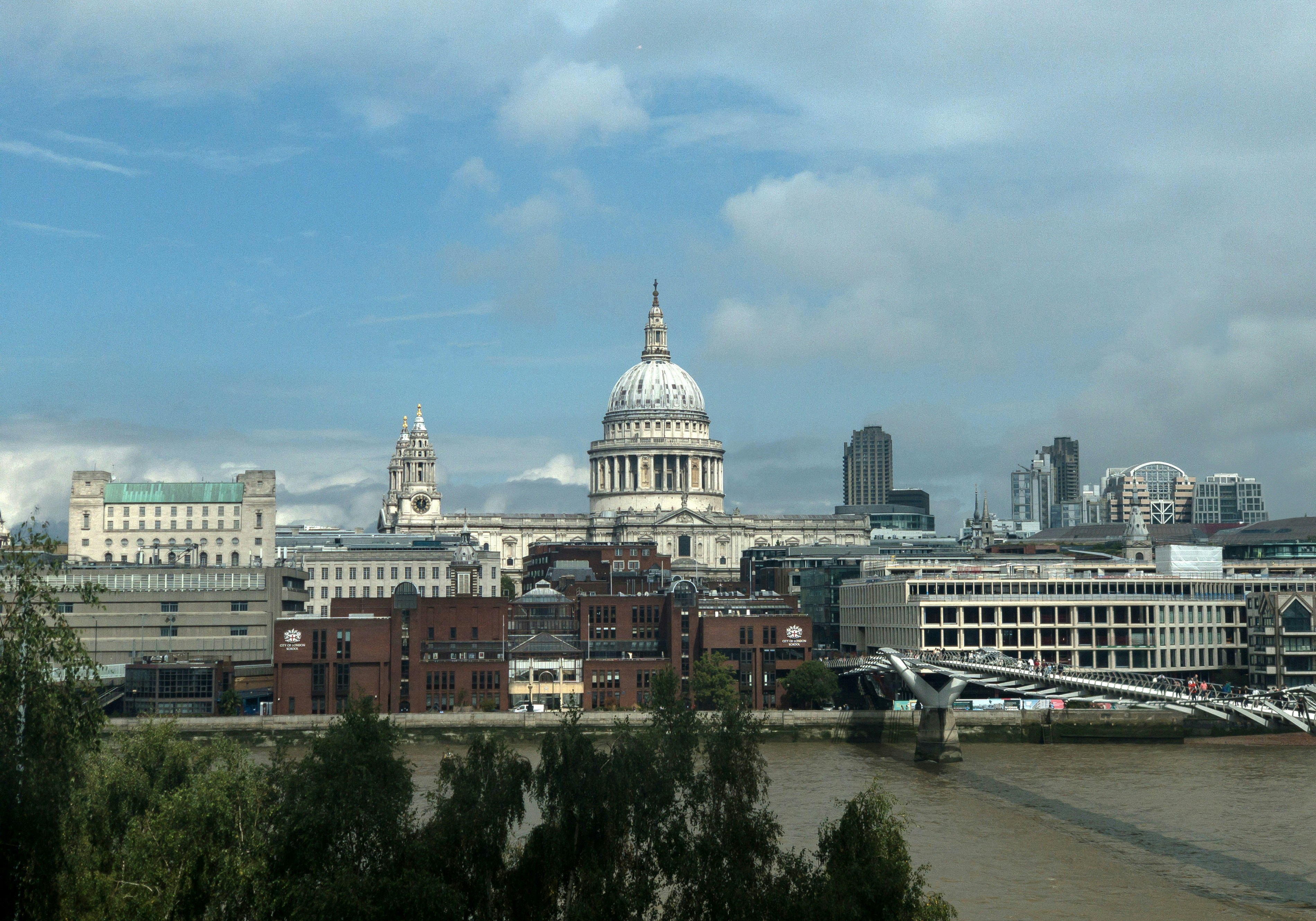 a view of the city of london from across the thames