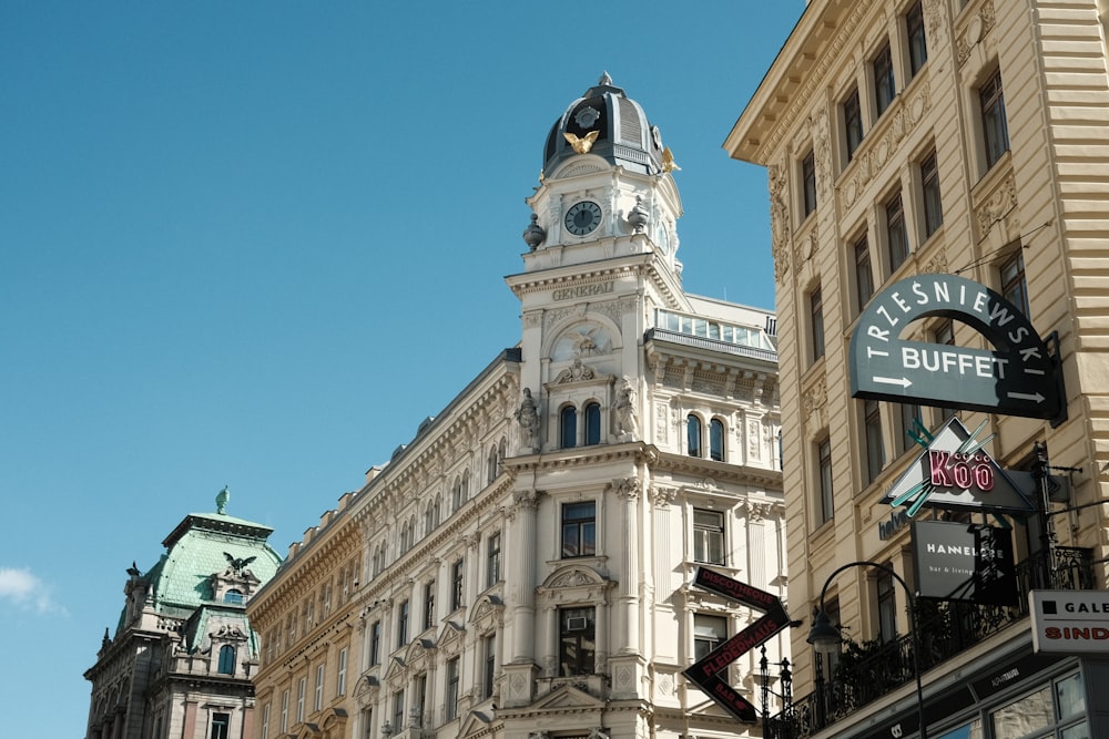 a tall building with a clock on the top of it