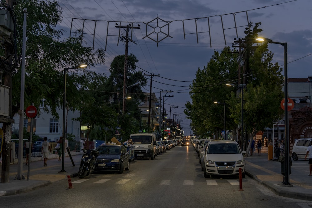 a street with cars parked on both sides of it